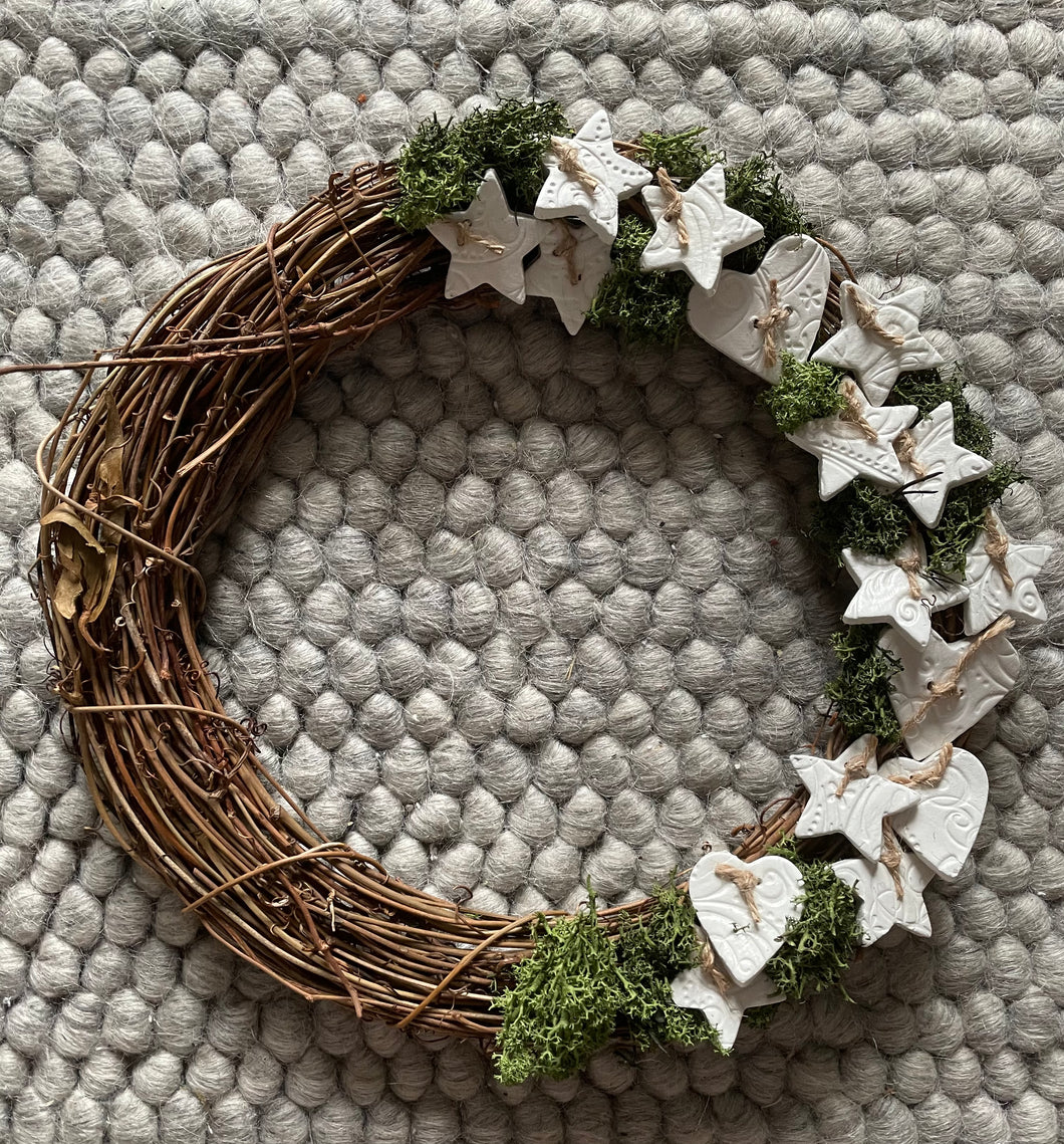 Wreath with clay accents
